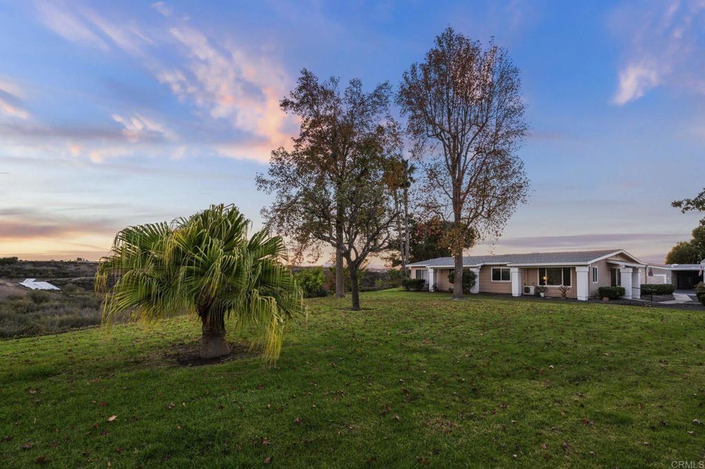 3757 Dearborn Street Oceanside, CA 92057 - Photo 26 of 33 a view of a yard with a house in the background
