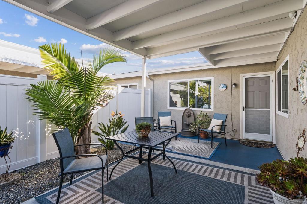 3757 Dearborn Street Oceanside, CA 92057 - Photo 27 of 33 a view of a porch with furniture and floor to ceiling window