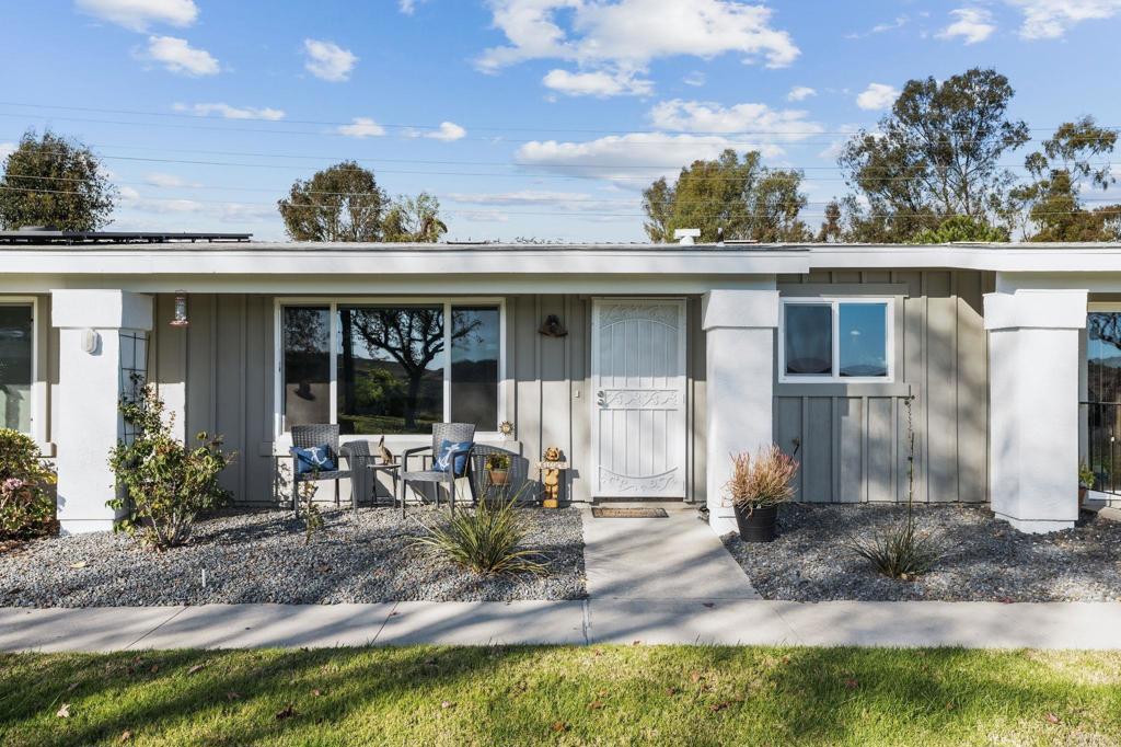3757 Dearborn Street Oceanside, CA 92057 - Photo 3 of 33 a front view of a house with garden