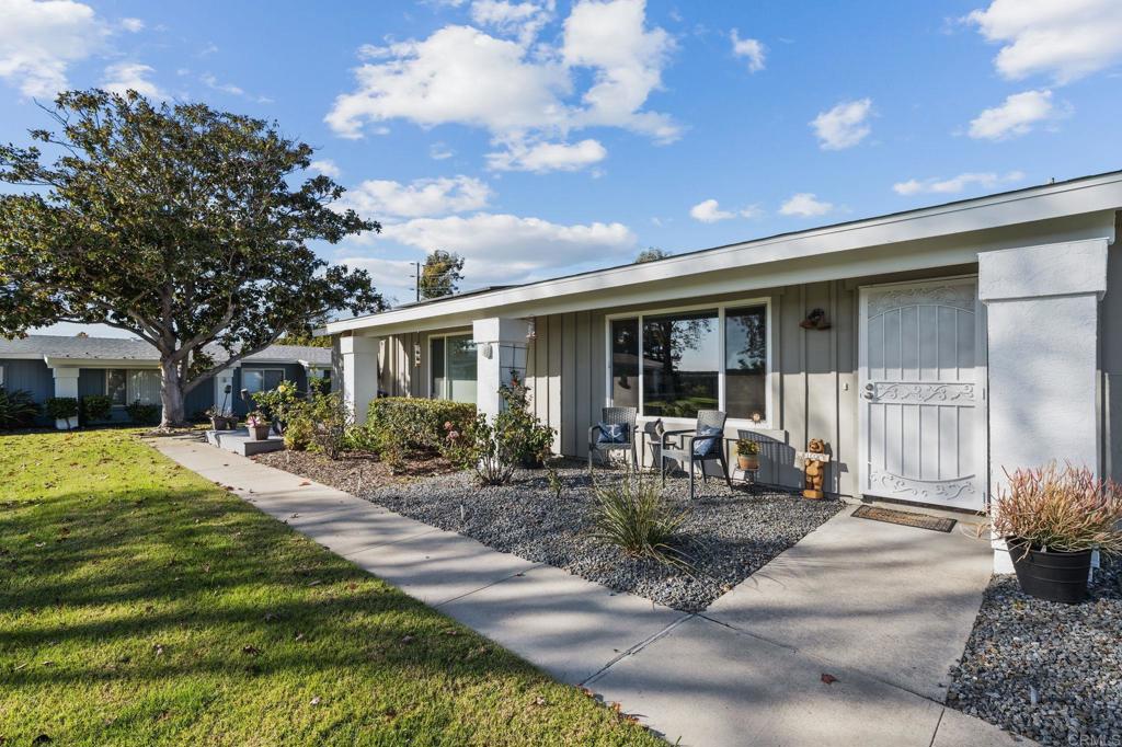 3757 Dearborn Street Oceanside, CA 92057 - Photo 31 of 33 a front view of house with yard and green space