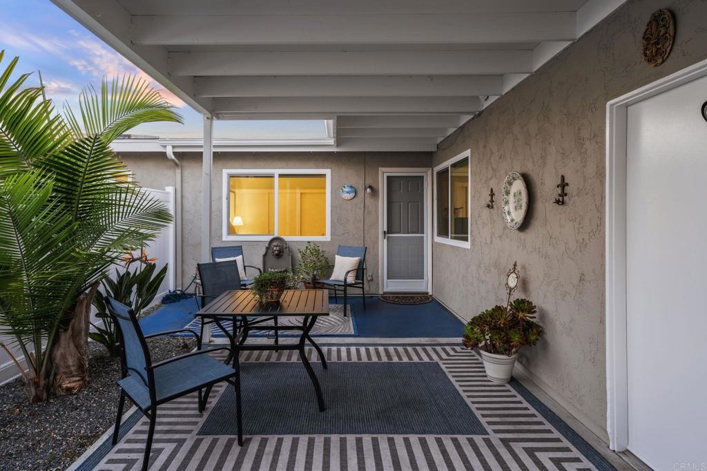 3757 Dearborn Street Oceanside, CA 92057 - Photo 5 of 33 a balcony with furniture and a potted plant