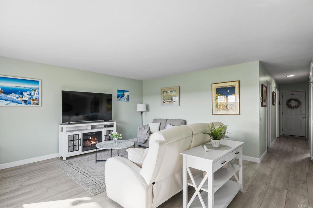 3757 Dearborn Street Oceanside, CA 92057 - Photo 9 of 33 a living room with furniture and a flat screen tv