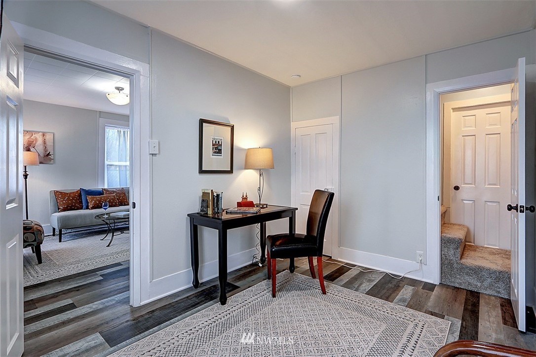 105 South Tobin Street Renton, WA 98057 - Photo 6 of 20 a workspace with furniture and wooden floor