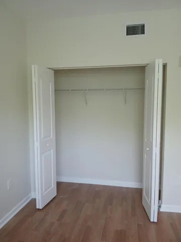 a view of small space with wooden floor