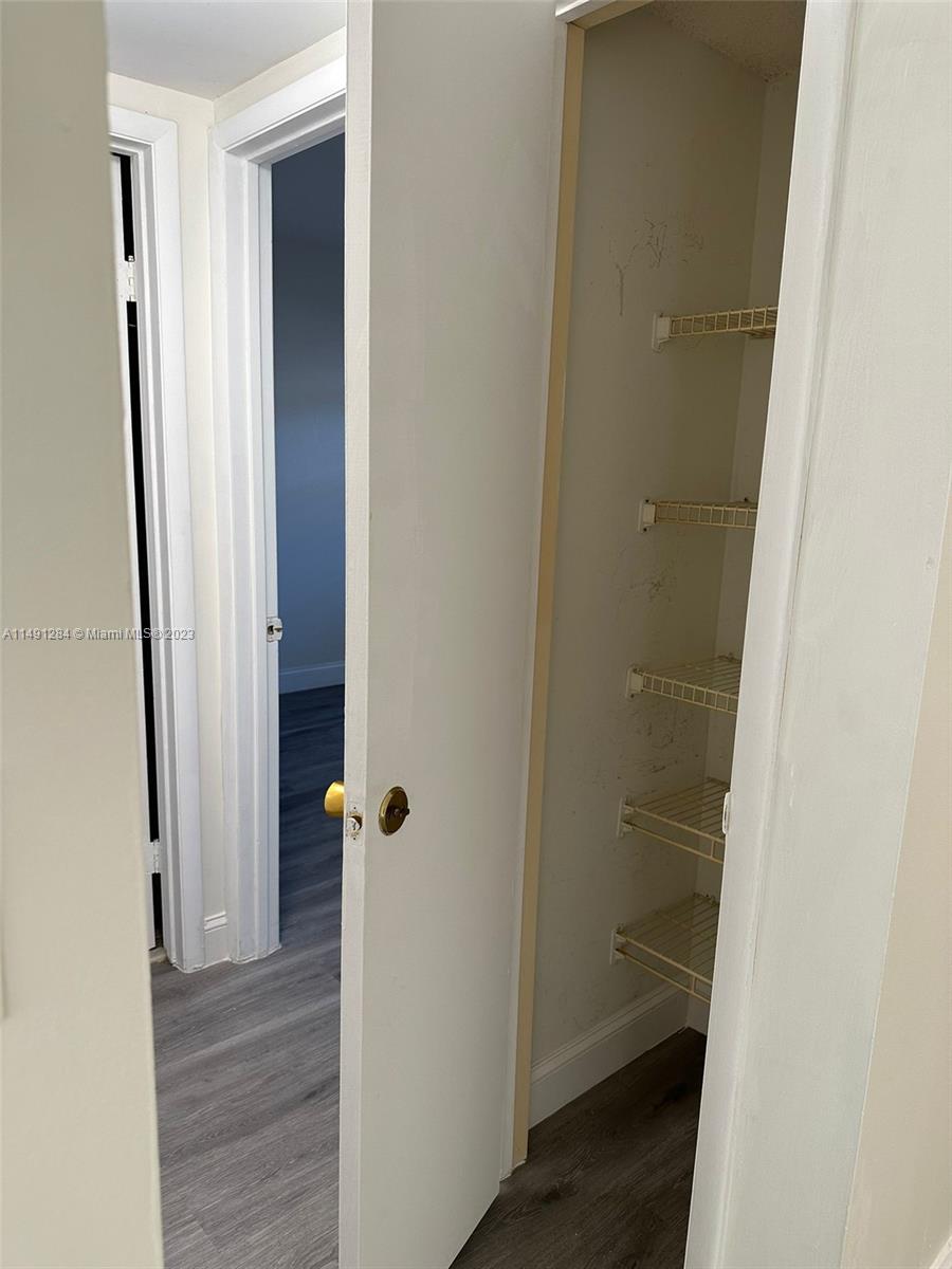 Arrowhead Condominium Davie, FL 33324 - Photo 18 of 23 a bathroom with a shower and a door