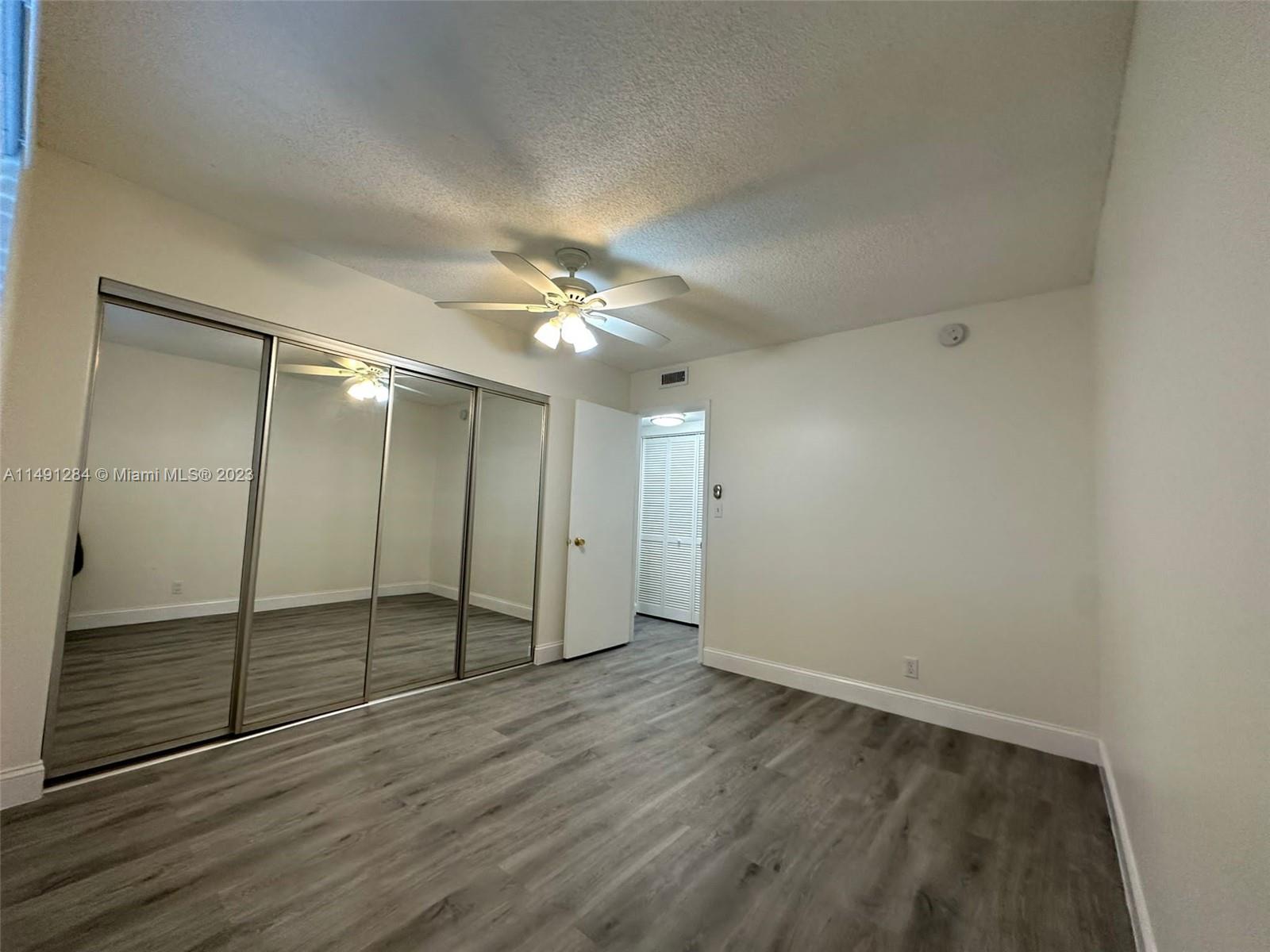 Arrowhead Condominium Davie, FL 33324 - Photo 21 of 23 wooden floor in an empty room