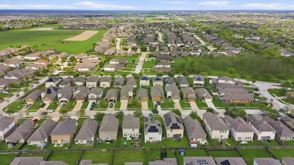 an aerial view of residential building with outdoor space