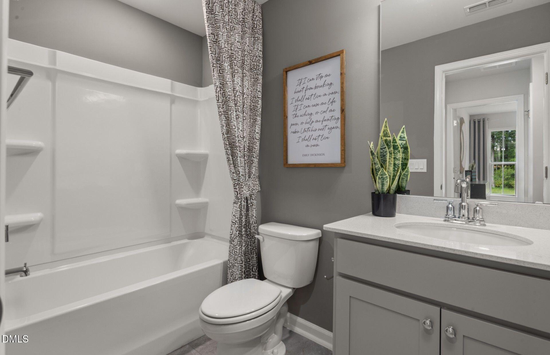 230 Broomside Avenue Raleigh, NC 27603 - Photo 25 of 25 a bathroom with a sink toilet and shower