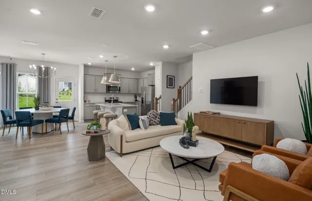 a view of a lake with a city skyline in the background