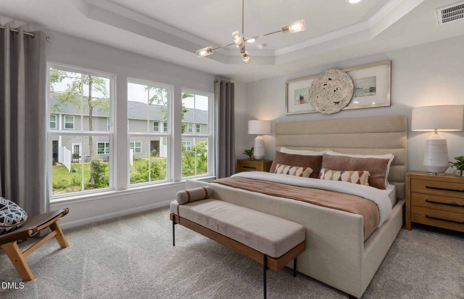 230 Broomside Avenue Raleigh, NC 27603 - Photo 19 of 25 a bedroom with a large bed and a window