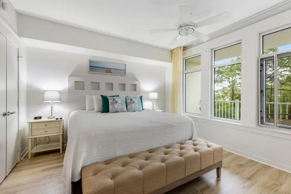 a bed room with a bed and a window