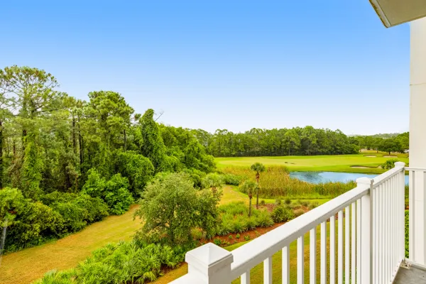 a view of a lake from a balcony