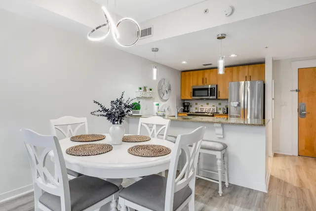 a view of a dining room with furniture