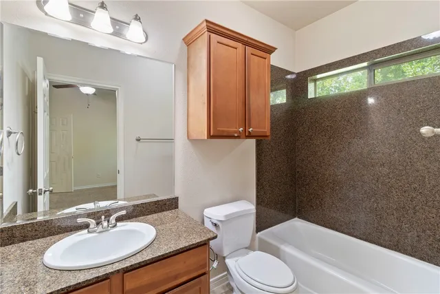 an empty room with a view of a livingroom