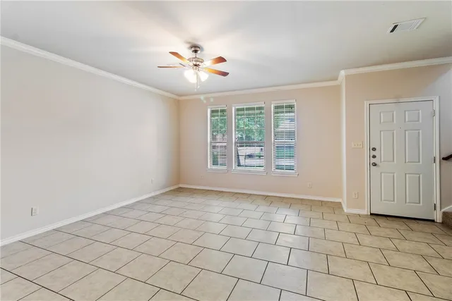 a view of an empty room and window