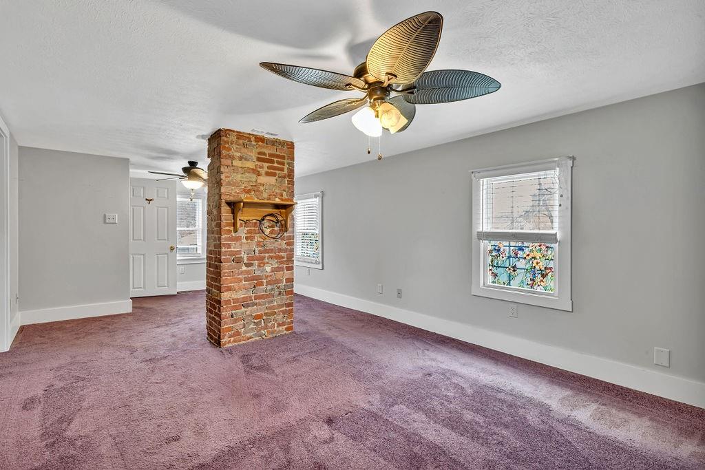 338 Buffalo Street Beaver, PA 15009 - Photo 14 of 21 wooden floor in an empty room with a window