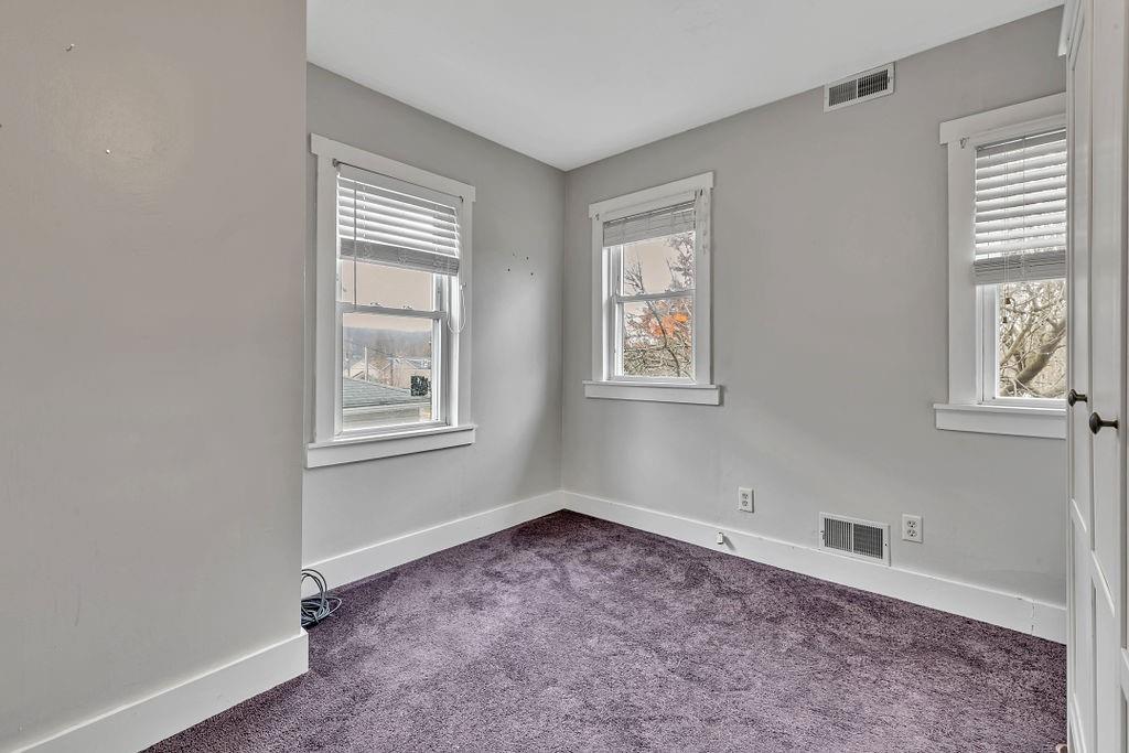 338 Buffalo Street Beaver, PA 15009 - Photo 16 of 21 an empty room with windows