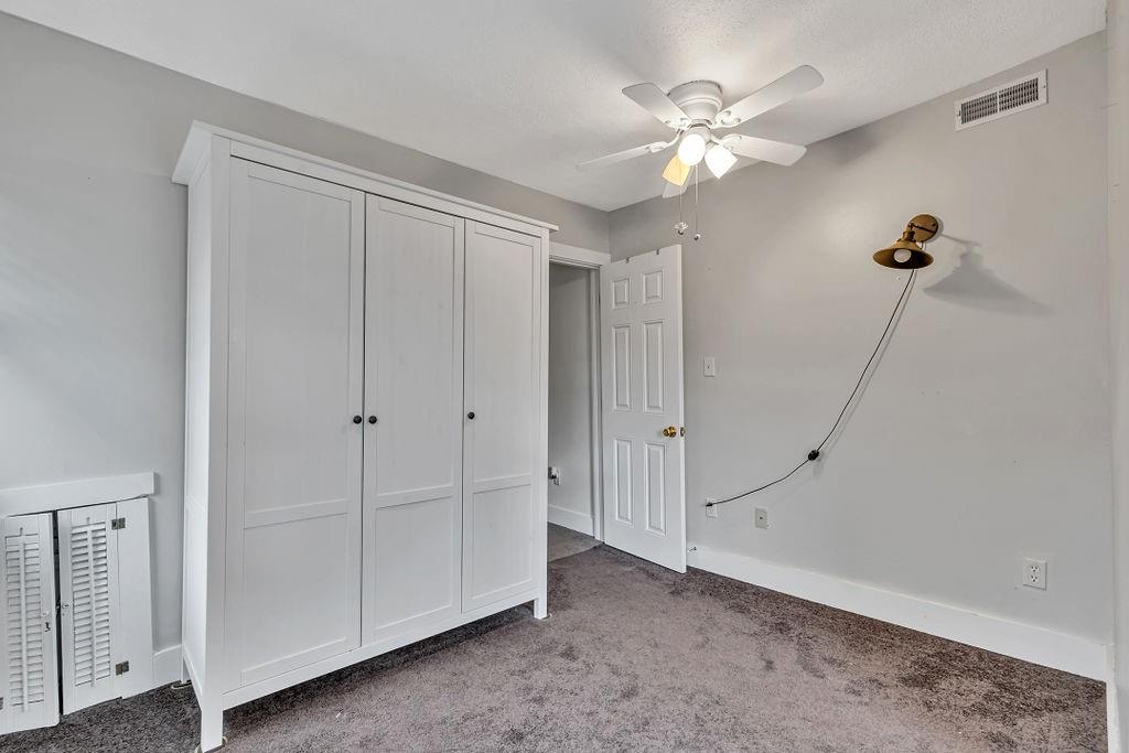 338 Buffalo Street Beaver, PA 15009 - Photo 17 of 21 a view of an empty room with a ceiling fan