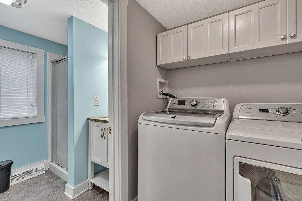 338 Buffalo Street Beaver, PA 15009 - Photo 5 of 21 a utility room with dryer and washer