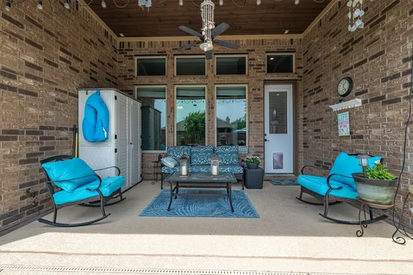 a building outdoor space with patio furniture