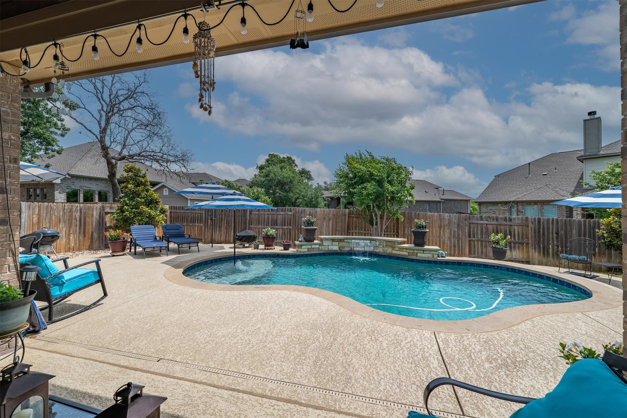 1004 Hezekiah Lane Leander, TX 78641 - Photo 30 of 36 an outdoor space with swimming pool and furniture