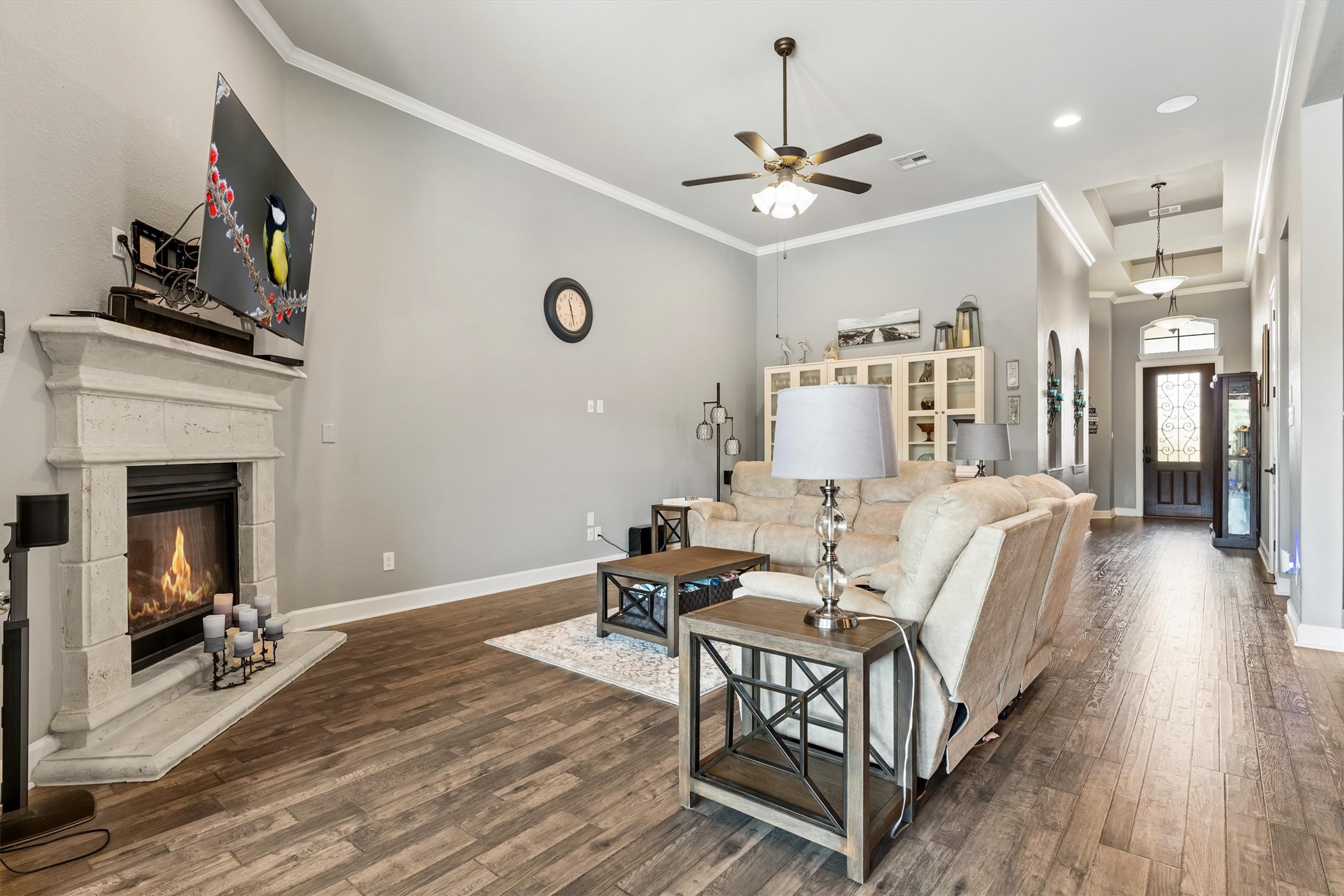 1004 Hezekiah Lane Leander, TX 78641 - Photo 8 of 36 a living room with furniture and a fireplace