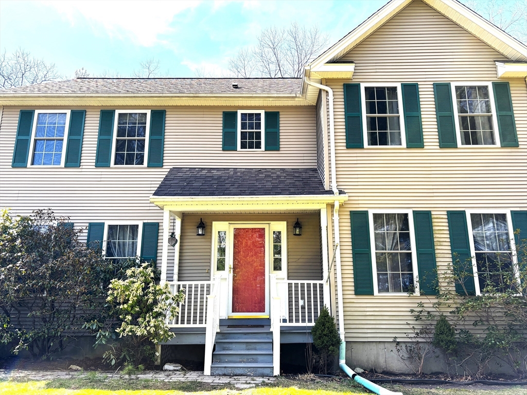 86 Coffey Hill Road Ware, MA 01082 - Photo 1 of 34 a front view of a house with garden