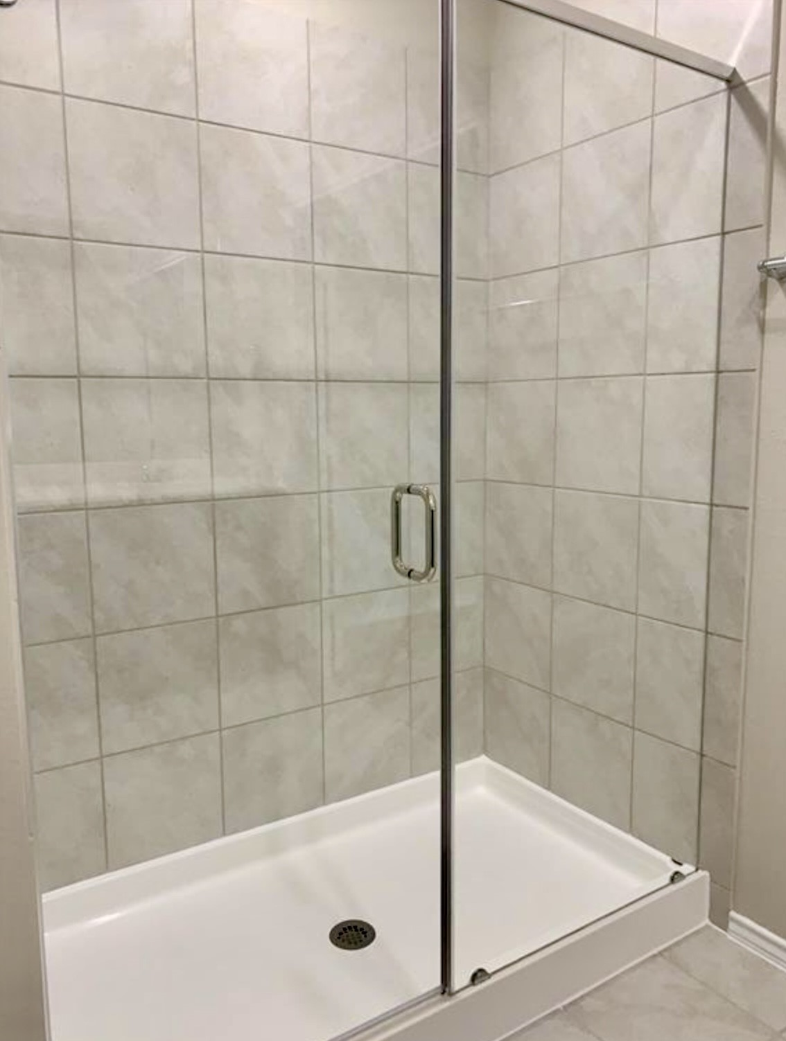 2203 Levant Lane Baytown, TX 77523 - Photo 11 of 17 a bathroom with a shower and a bathtub
