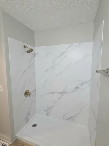 a bathroom with a bathtub