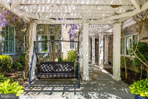 a view of a entryway door of the house and front view of a house