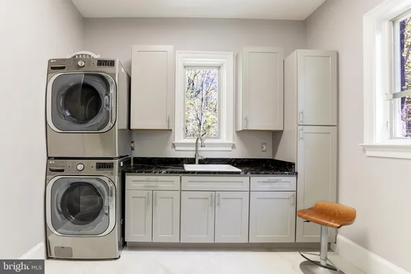 a bathroom with a bathtub and a sink