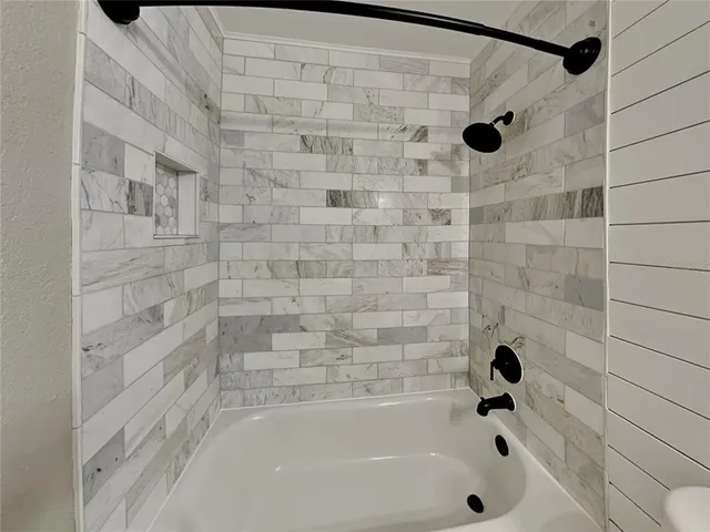 a bathroom with a bathtub
