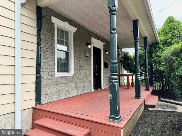 a patio with table and chairs