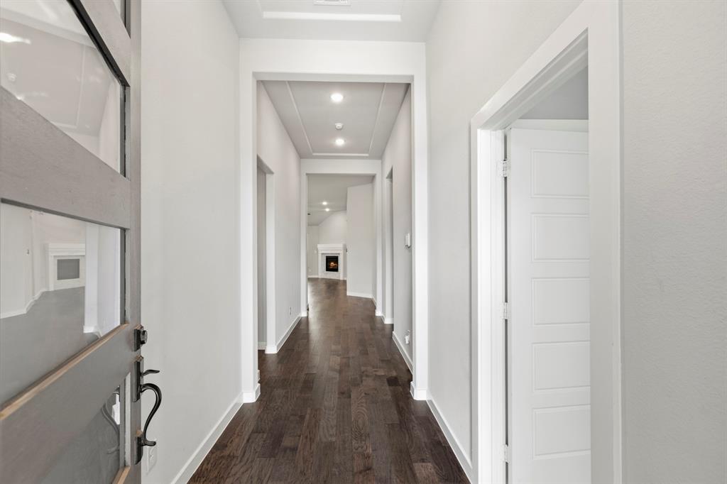 3311 Willena Road Melissa, TX 75454 - Photo 6 of 40 Entryway featuring dark wood-finish flooring, white walls, and recessed lighting