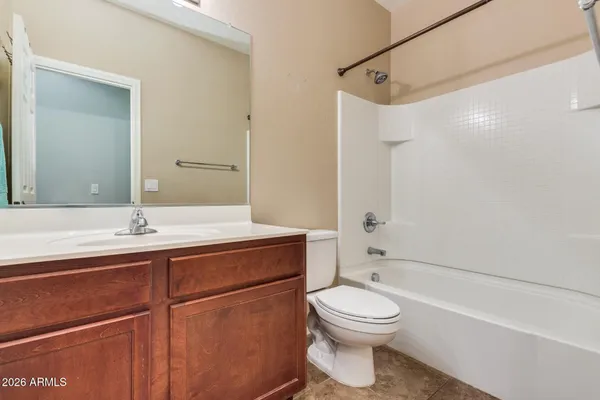 an empty room with closet area