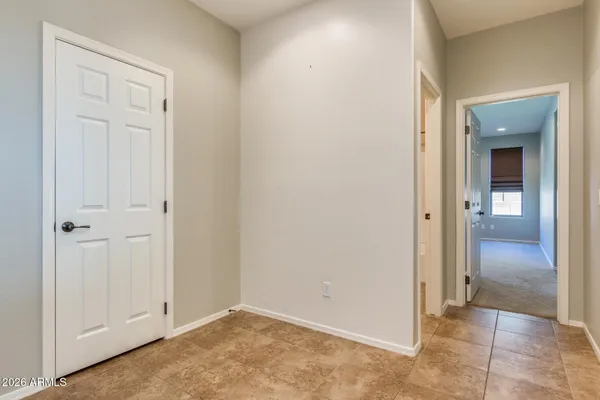 a view of an entryway with a garden