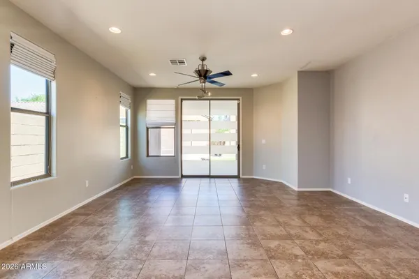 a kitchen with stainless steel appliances granite countertop a sink stove and microwave