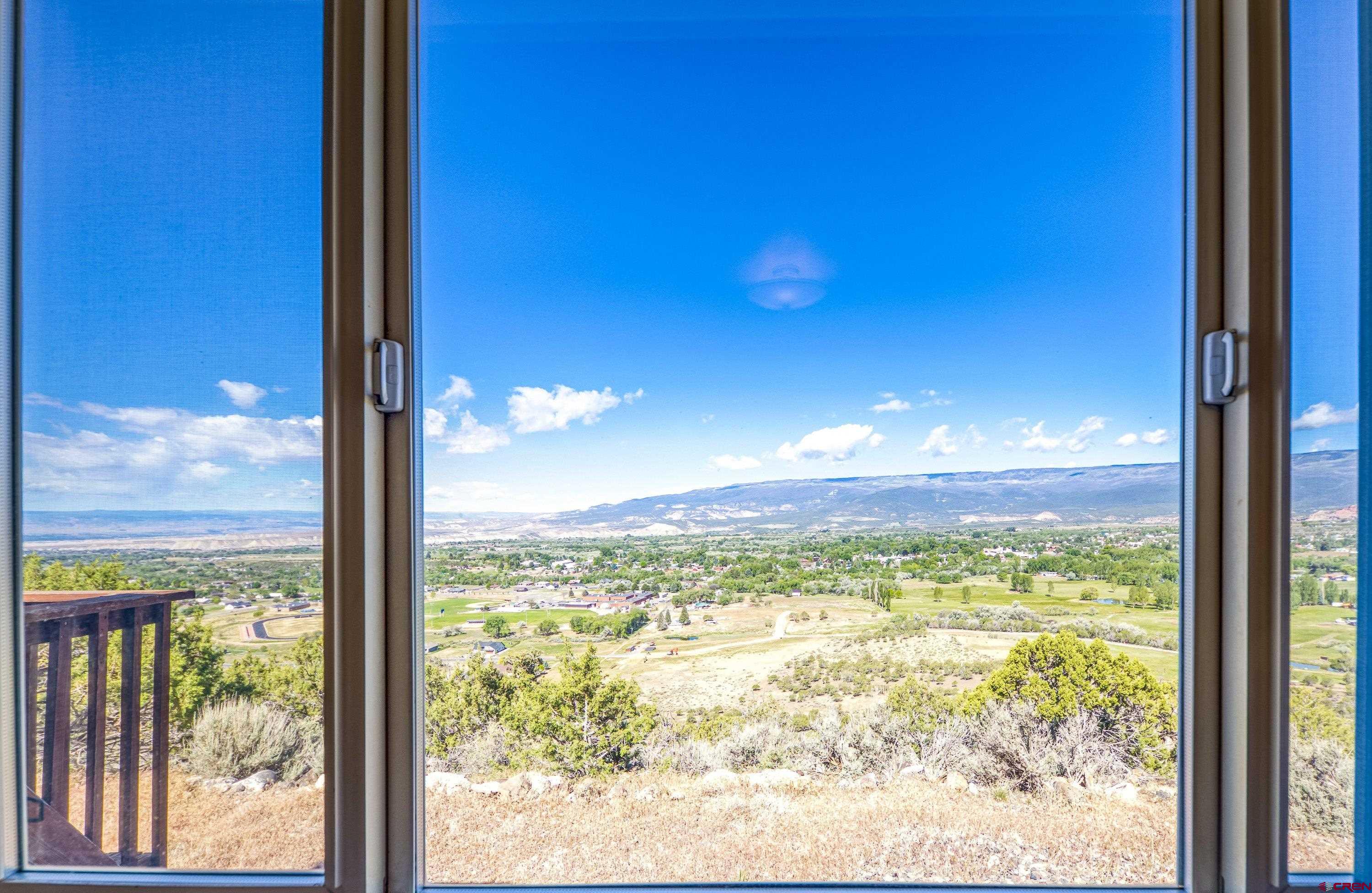 24239 Valley View Circle Cedaredge, CO 81413 - Photo 3 of 18 a view of a city from a room