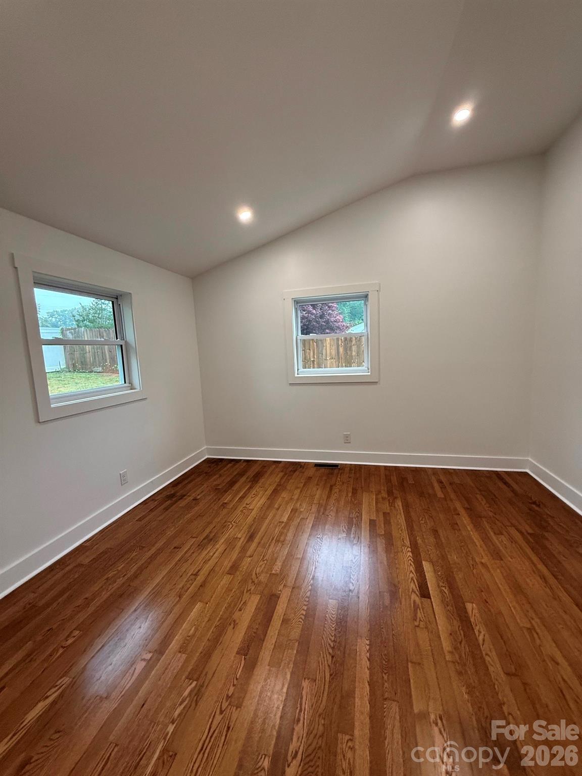 2677 Pax Hill Road Morganton, NC 28655 - Photo 13 of 15 a view of an empty room and wooden floor