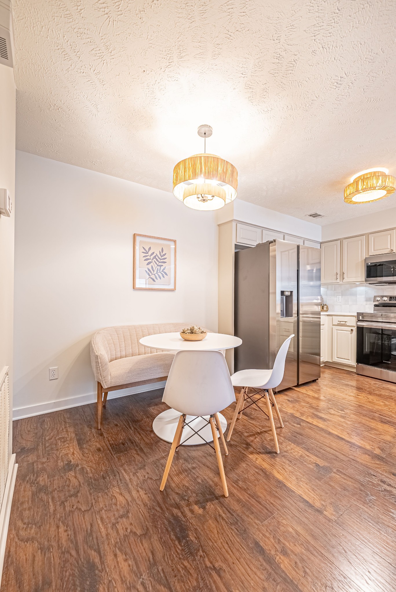 423 Compton Lane Franklin, TN 37069 - Photo 11 of 23 a living room with furniture and a dining table with wooden floor