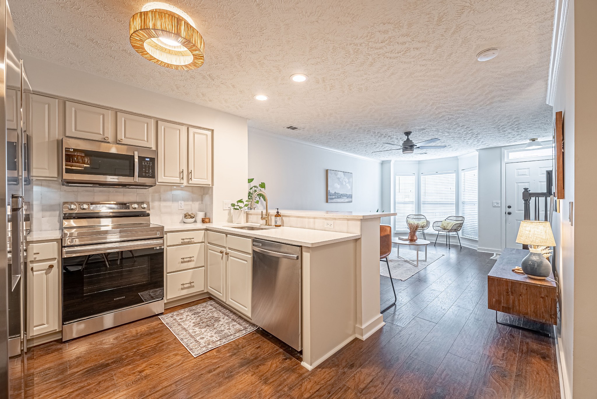 423 Compton Lane Franklin, TN 37069 - Photo 9 of 23 a kitchen with a stove a sink and a refrigerator