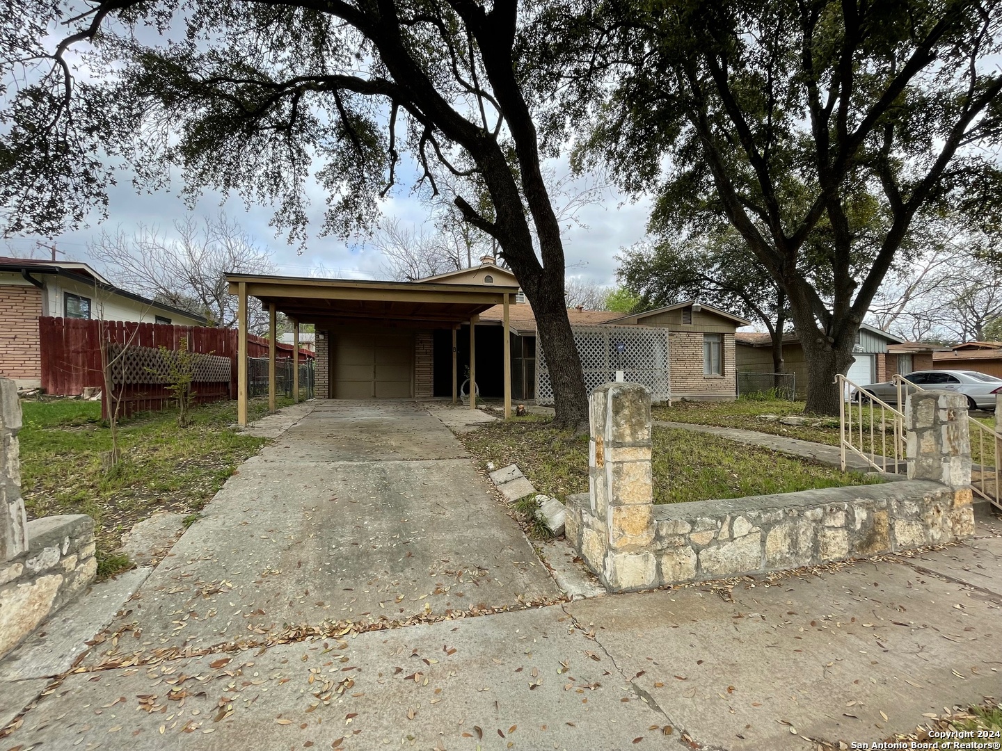 411 Future Drive San Antonio, TX 78213 - Photo 8 of 21 front view of a house with a tree