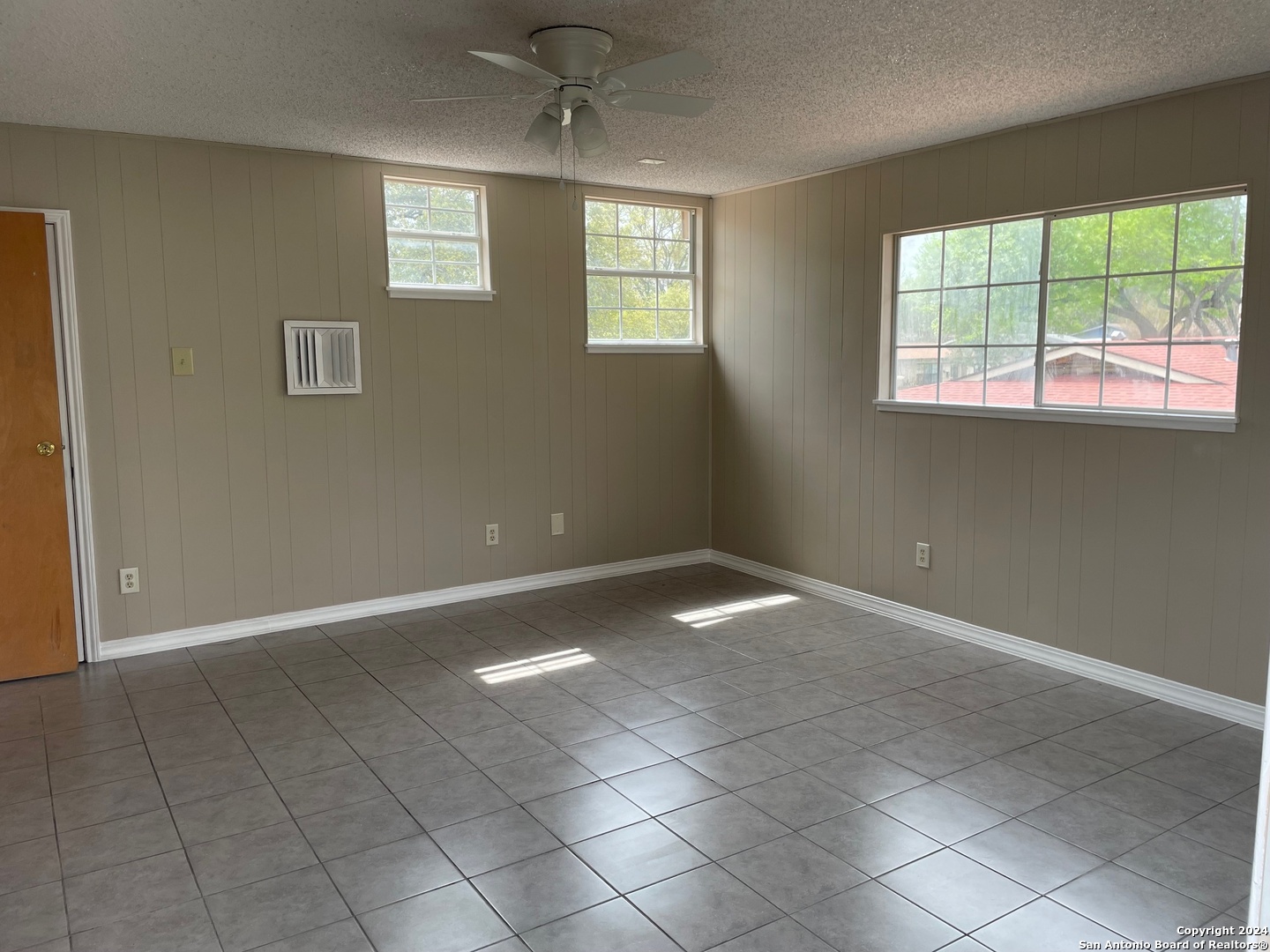 411 Future Drive San Antonio, TX 78213 - Photo 9 of 21 a view of an empty room with a window