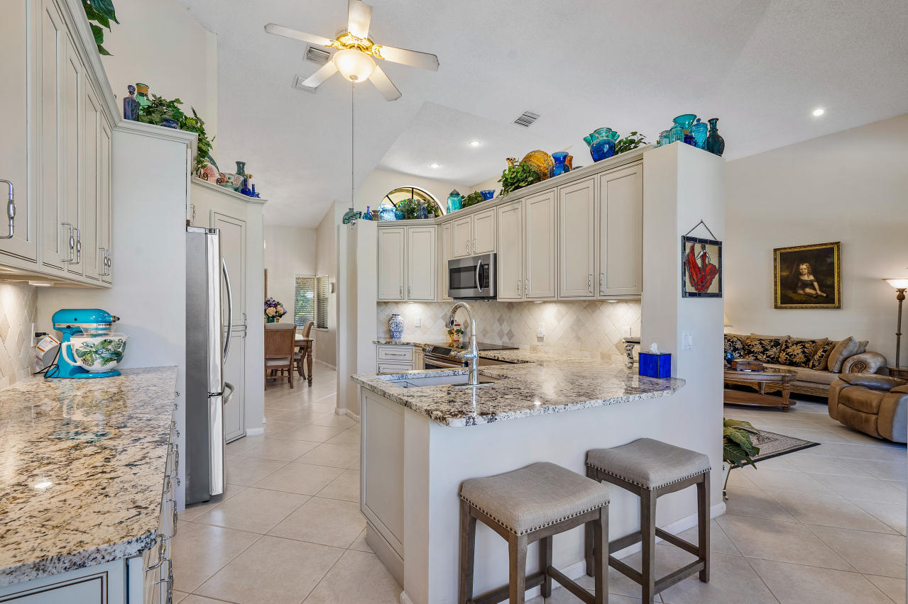 2335 Rabbit Hollowe Circle Delray Beach, FL 33445 - Photo 6 of 43 Kitchen wide from breakfast area