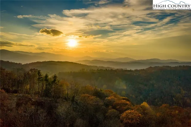 a view of lake with mountain