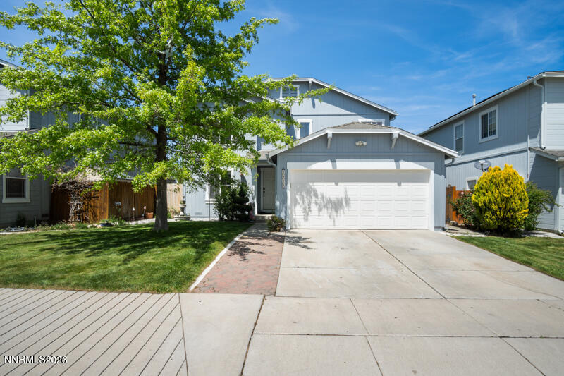 7873 Welsh Drive Reno, NV 89506 - Photo 1 of 34 a view of a house with a yard