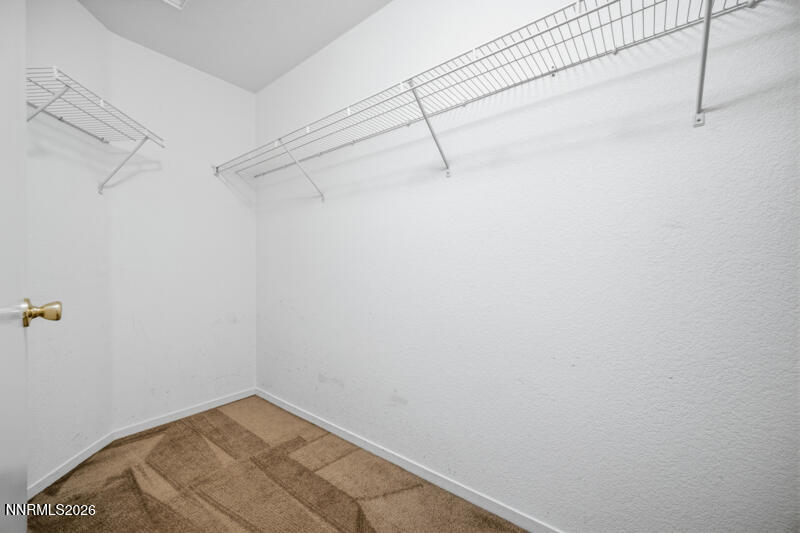 7873 Welsh Drive Reno, NV 89506 - Photo 14 of 34 a view of a room with racks on the wall