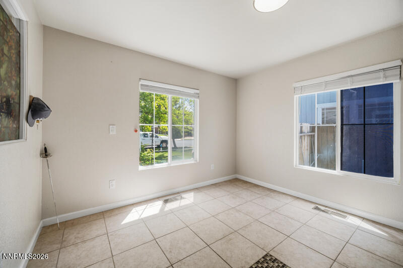 7873 Welsh Drive Reno, NV 89506 - Photo 15 of 34 a view of an empty room with a window