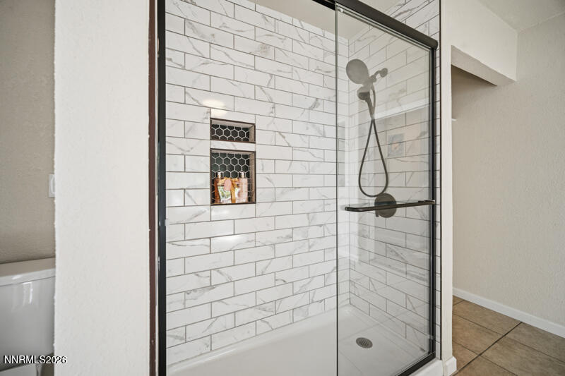 7873 Welsh Drive Reno, NV 89506 - Photo 18 of 34 a bathroom with a shower