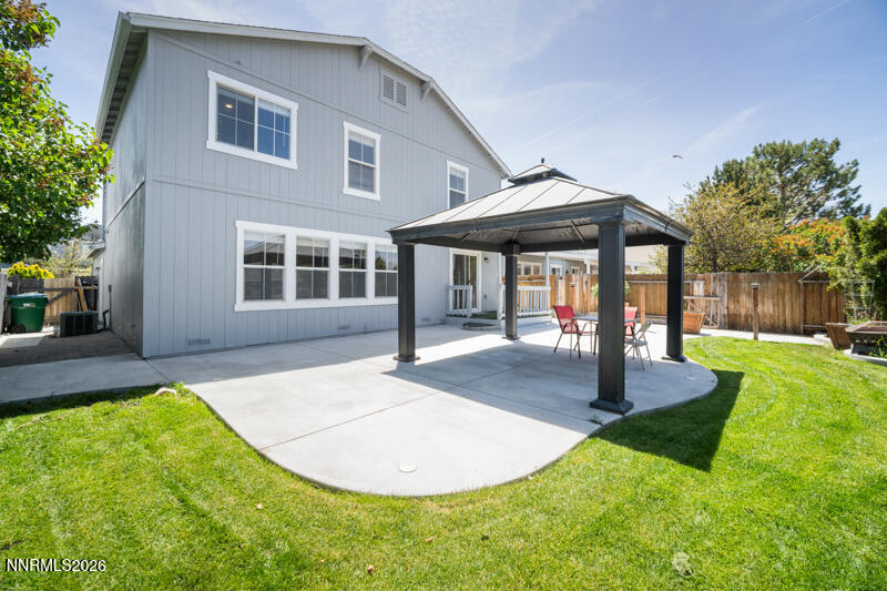 7873 Welsh Drive Reno, NV 89506 - Photo 33 of 34 a front view of a house with garden